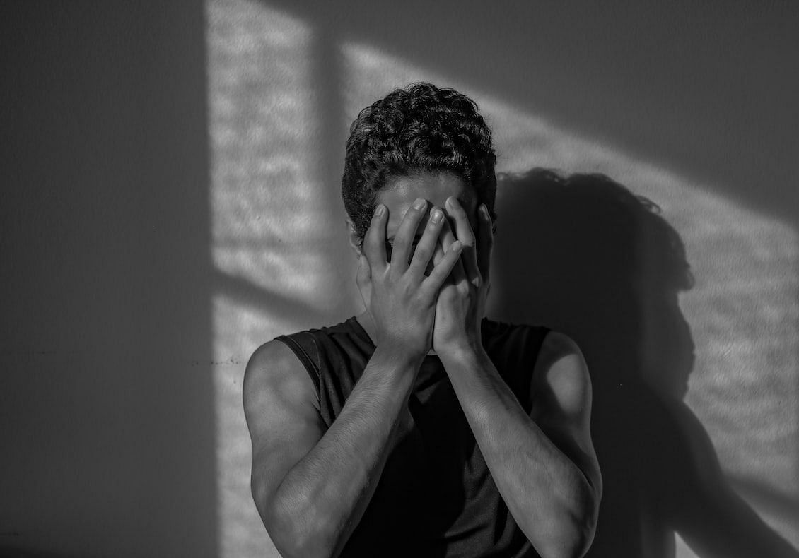 , symptoms of RAD may include a lack of interest in social interactions, difficulty forming close relationships (Yasser Mutwakil /Unsplash)